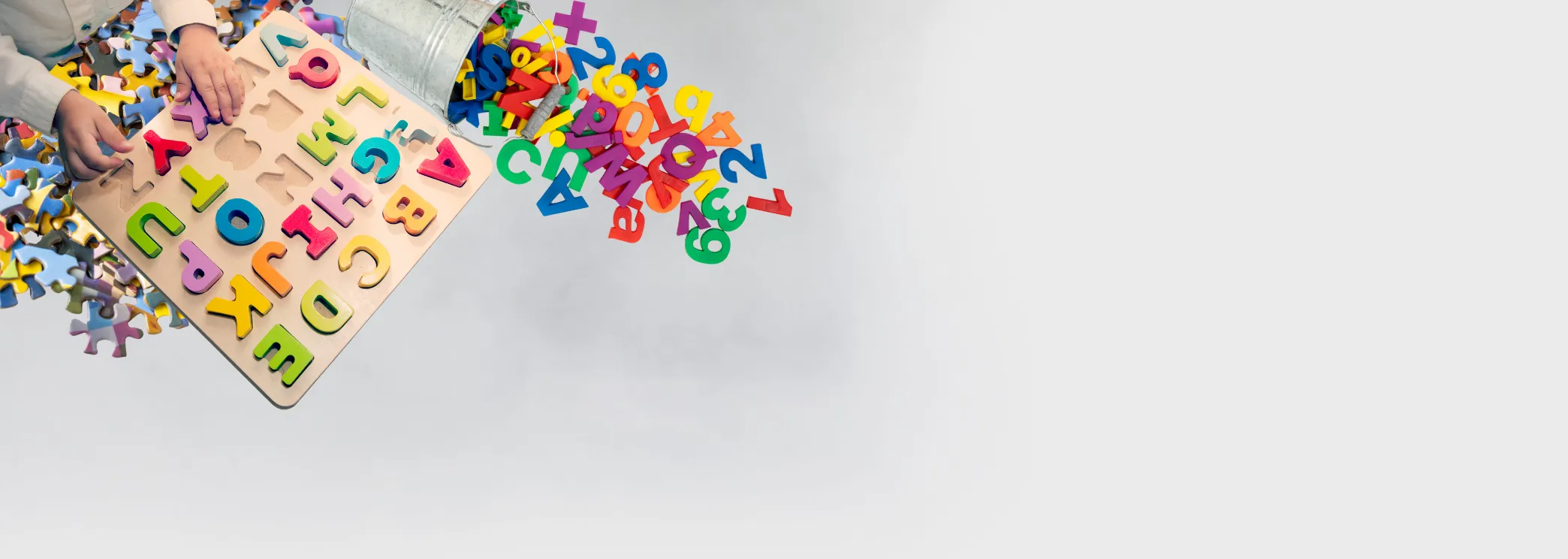 Puzzles & Lernspiele Collage Symbolbild