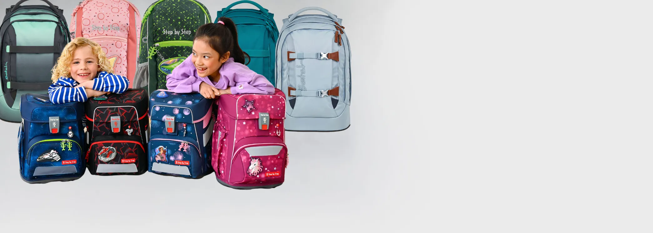 Kinder mit Rucksäcken Symbolbild